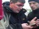 У Харкові протестувальники побили чоловіка з нібито прокурорським посвідченням і номером одного з лідерів "ЛНР"